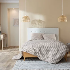 Lit avec sommier et tête de lit capitonnée en velours