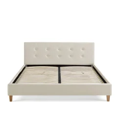 Lit en velours avec pieds en bois