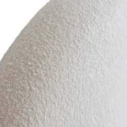 Lit tissu beige avec tête de lit bouclette