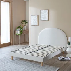 Lit tissu beige avec tête de lit bouclette